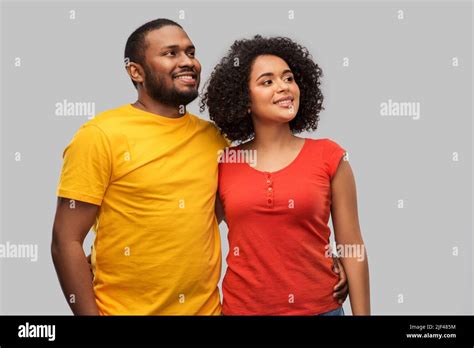 happy african american couple hugging Stock Photo - Alamy