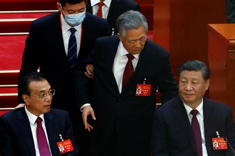 Former Chinese President Hu Jintao unexpectedly led out of Communist ...