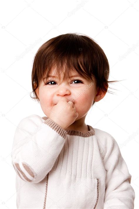 Cute mischievous baby toddler face — Stock Photo © phakimata #4995496