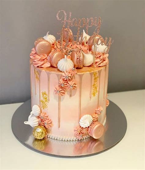 This peachy drip cake is just stunning! With perfectly piped buttercream swirls, macarons and ...