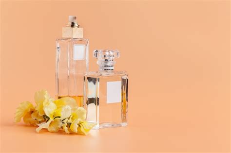 Premium Photo | Perfume bottles with flowers