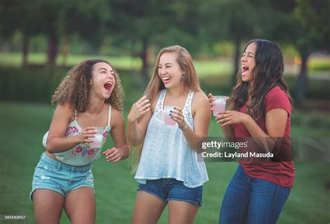 Best Friends Laughing Teen Girls High-Res Stock Photo - Getty Images