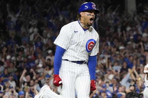 Cubs prevail in high-scoring affair vs. Giants | Reuters