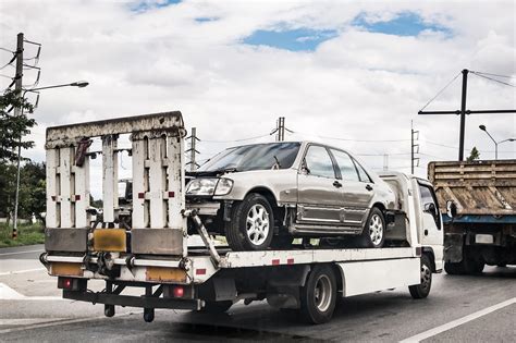 When To Insist On A Flatbed To Tow Your Car - Reliable Guys Towing Service