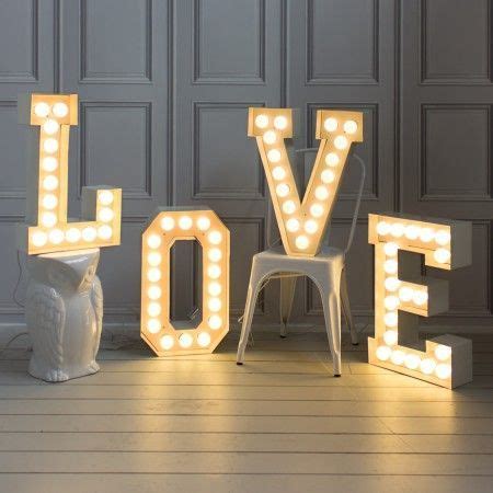 These spectacular metal letter lights have an array of LED bulbs which ...