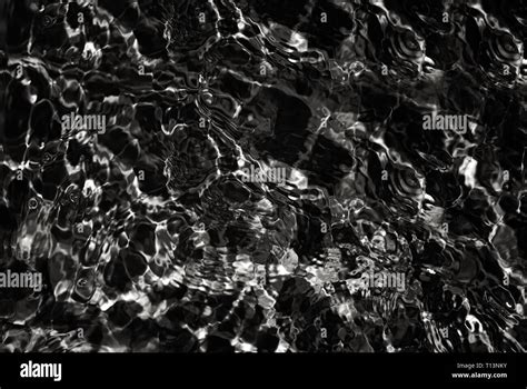 Crude oil surface texture background. Abstract black oil pattern Stock Photo - Alamy