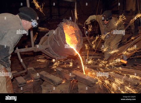 Molten steel pouring Stock Photo - Alamy