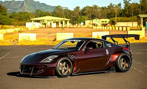 Nissan 350Z by Rocket Bunny | Nissan 350z, Wide body kits, Body kits cars