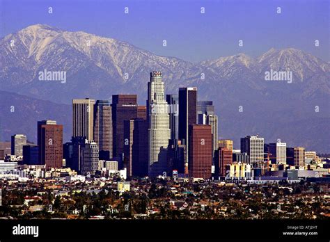 los angeles skyline and snow covered San Bernardino mountains Stock ...