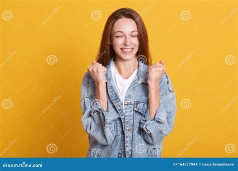 Horizontal Shot of Happy Accomplished and Joyful Woman Celebrating Victory or Success, Posing ...