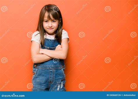 Upset Little Girl Frowning in a Studio Stock Photo - Image of little ...