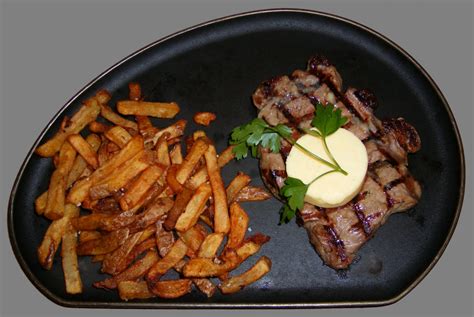 File:Sirloin steak with garlic butter and french fries cropped.jpg ...