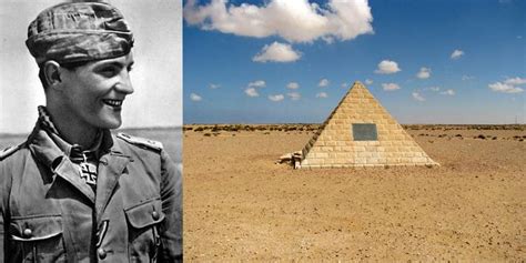 an old photo of a man in uniform next to a pyramid with a sky background