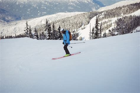 Free Photo | Skier skiing on snowy mountains