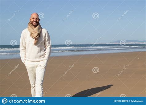 Smiling Handsome Man Walking Alone on Beach Stock Photo - Image of ...