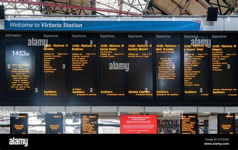London, United Kingdom - January 2019: Timetable listing the many train connections at Victoria ...