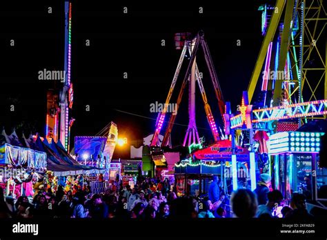 People Enjoying Fast Spinning Amusement Rides at The Royal Melbourne ...