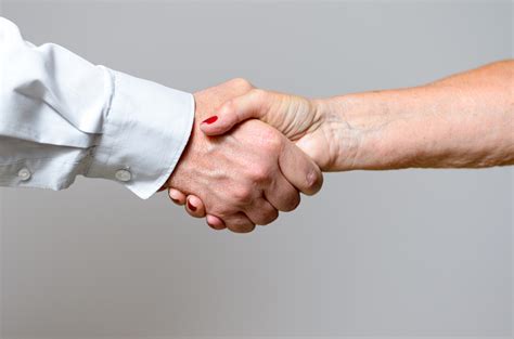 Conceptual Handshake Gesture of Two Adult Hands - 500px