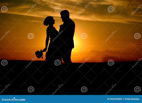 Silhouette Photo of Couple at Sunset Stock Photo - Image of scenic, adult: 262245684