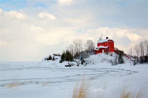 The colorful Marquette Lighthouse on a cold winter day. Marquette, MI | Michigan nature, Lake ...