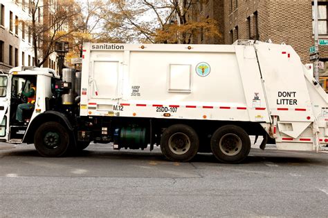 Truck crushes hand of sanitation worker who moonlights as artist