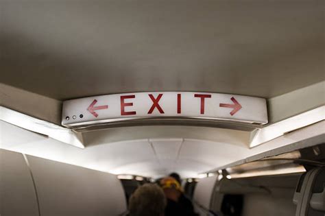 Airplane Emergency Exit Stock Photos, Pictures & Royalty-Free Images ...