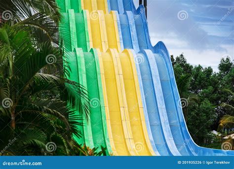 Water Slides in Tropical Waterpark Stock Photo - Image of comfort ...