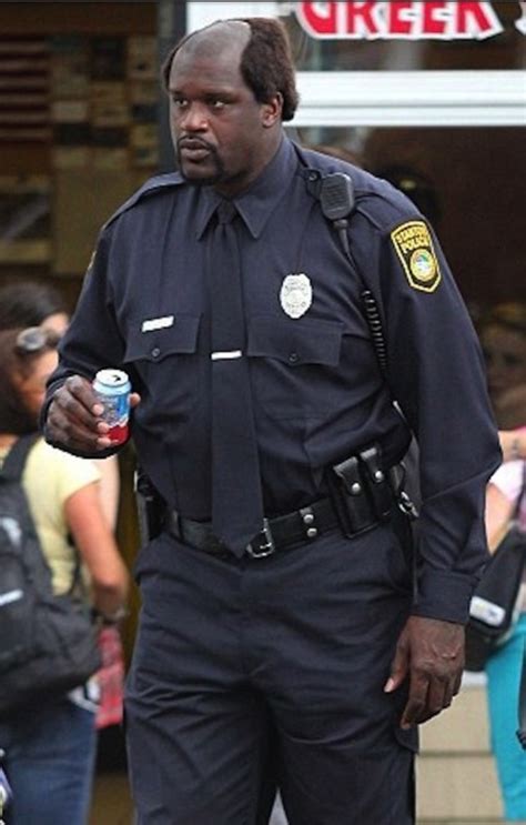 This is Shaq holding a ounce can of soda - Meme Guy