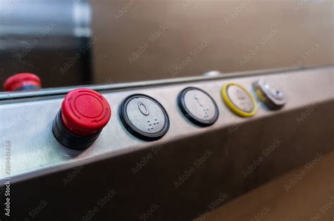 Emergency stop button of an elevator Stock Photo | Adobe Stock