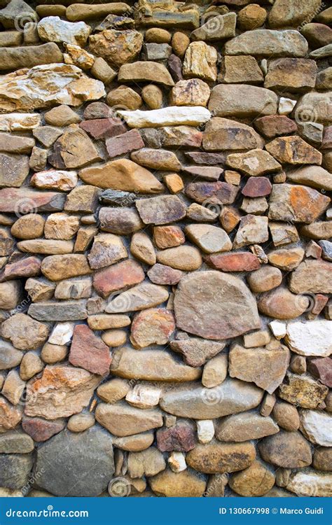 River stone wall stock photo. Image of shape, surface - 130667998