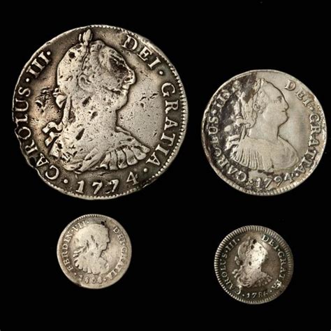 Four Spanish Colonial Milled Silver Coins (Lot 99 - Coins & CurrencyFeb 17, 2016, 6:00pm)