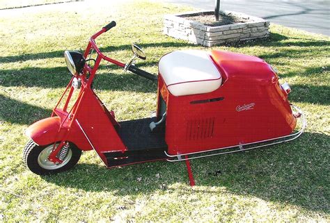 1948 Cushman model 52. Used to ride home from Lane on the back of Leroy's Blue one. Finally got ...