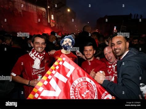 Liverpool fans celebrate outside Anfield Stock Photo - Alamy