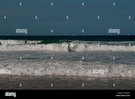 Surfing on Manly beach, Sydney, NSW, Australia Stock Photo - Alamy