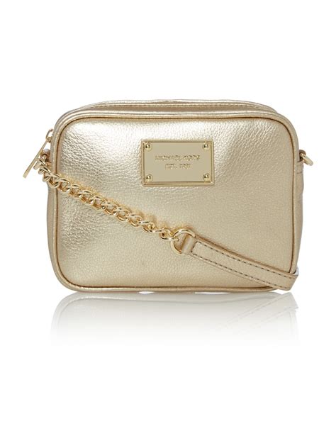 Michael kors Jet Set Item Gold Cross Body Bag in Metallic | Lyst