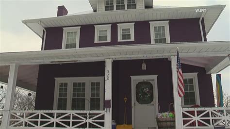 Michigan family's purple house painted in TCU colors as they root against Wolverines | wfaa.com