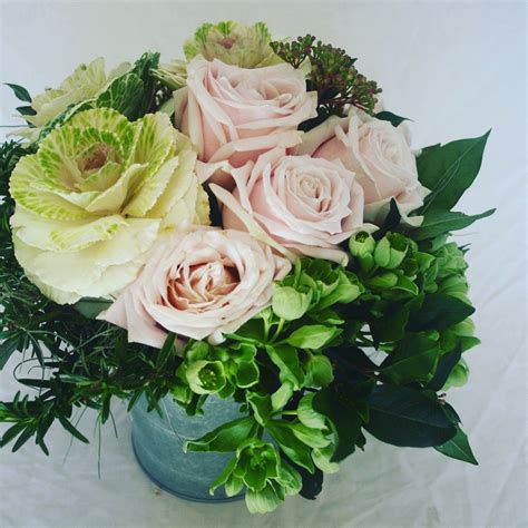 Kale, roses and hellebore flower arrangement | Flower arrangements ...