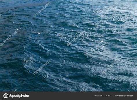 Sea surface with waves — Stock Photo © leungchopan #141763012