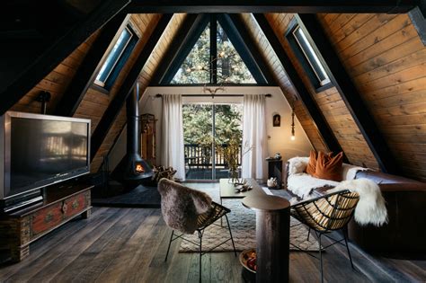 1970s A-frame cabin transformed into light-filled modern getaway