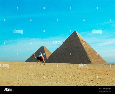 Pyramids on a landscape, Giza Pyramids, Giza, Cairo, Egypt Stock Photo ...