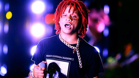 Red Braided Hair Trippie Redd Is Standing In Colorful Lights Background Wearing Black T-Shirt HD ...