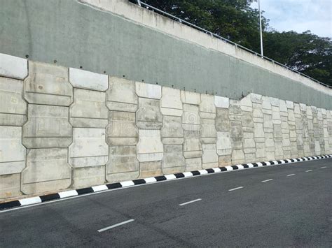 Precast Concrete Retaining Wall Panels are Installed in Layers As a ...