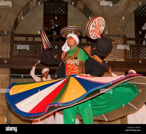 whirling dervish Sufi dancer in motion at performace in Cairo Egypt Stock Photo - Alamy