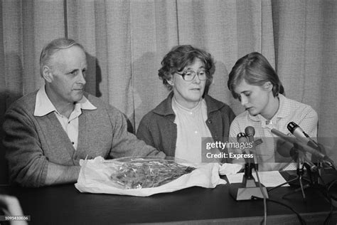 Michael and Queenie Fletcher with one of their daughters at a press ...