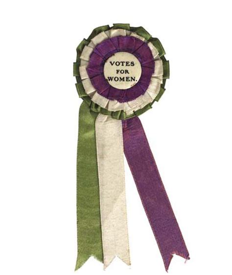 Suffragette rosette and badge with ribbons in the white purple and ...