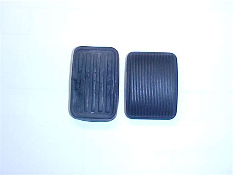 Replacement rubber on top, original on bottom.