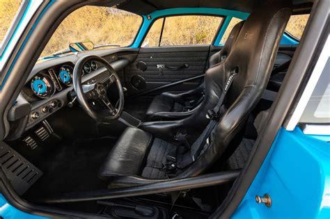 Volvo P1800 Cyan Racing Continuation Is a Carbon-Fiber Restomod