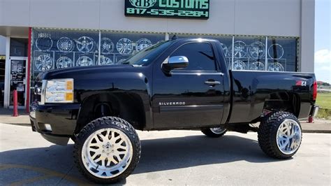 Single Cab Silverado with a 7.5" Rough Country Lift and 22x14 American ...