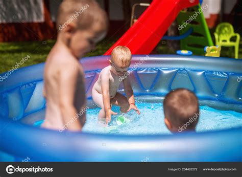 Baby Kids Playing Baby Pool Backyard Kids Pool Having Fun — Stock Photo © dusanpetkovic #204482272