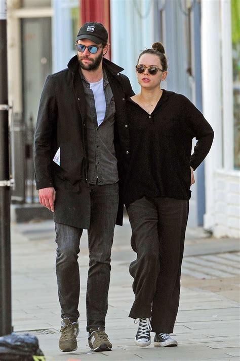 Daisy Ridley and boyfriend Tom Bateman enjoys a romantic stroll around Primrose Hill in London, UK